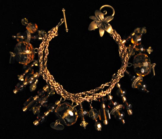 [Carolyn's amber-coloured bracelet]